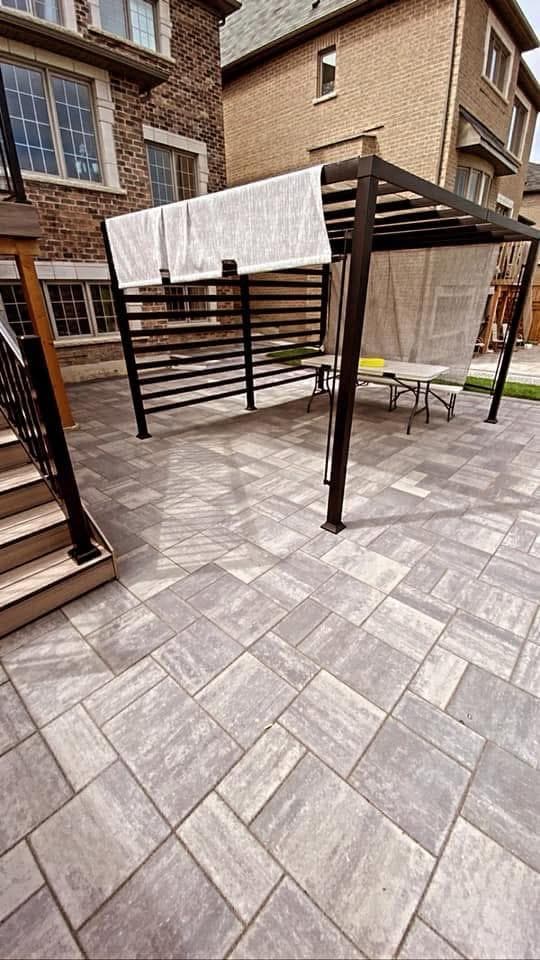 Interlocking patio with pergola